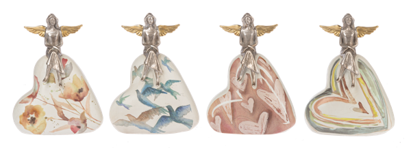 Angel sitting on a Heart